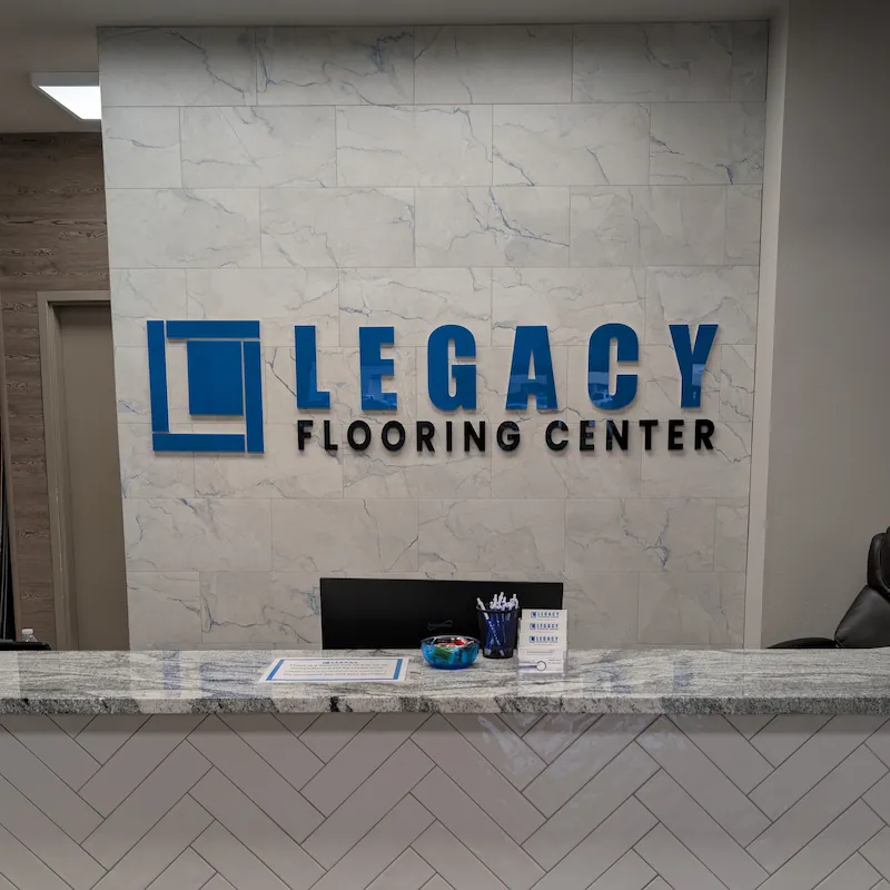 Legacy Flooring's main showroom doors with sign above