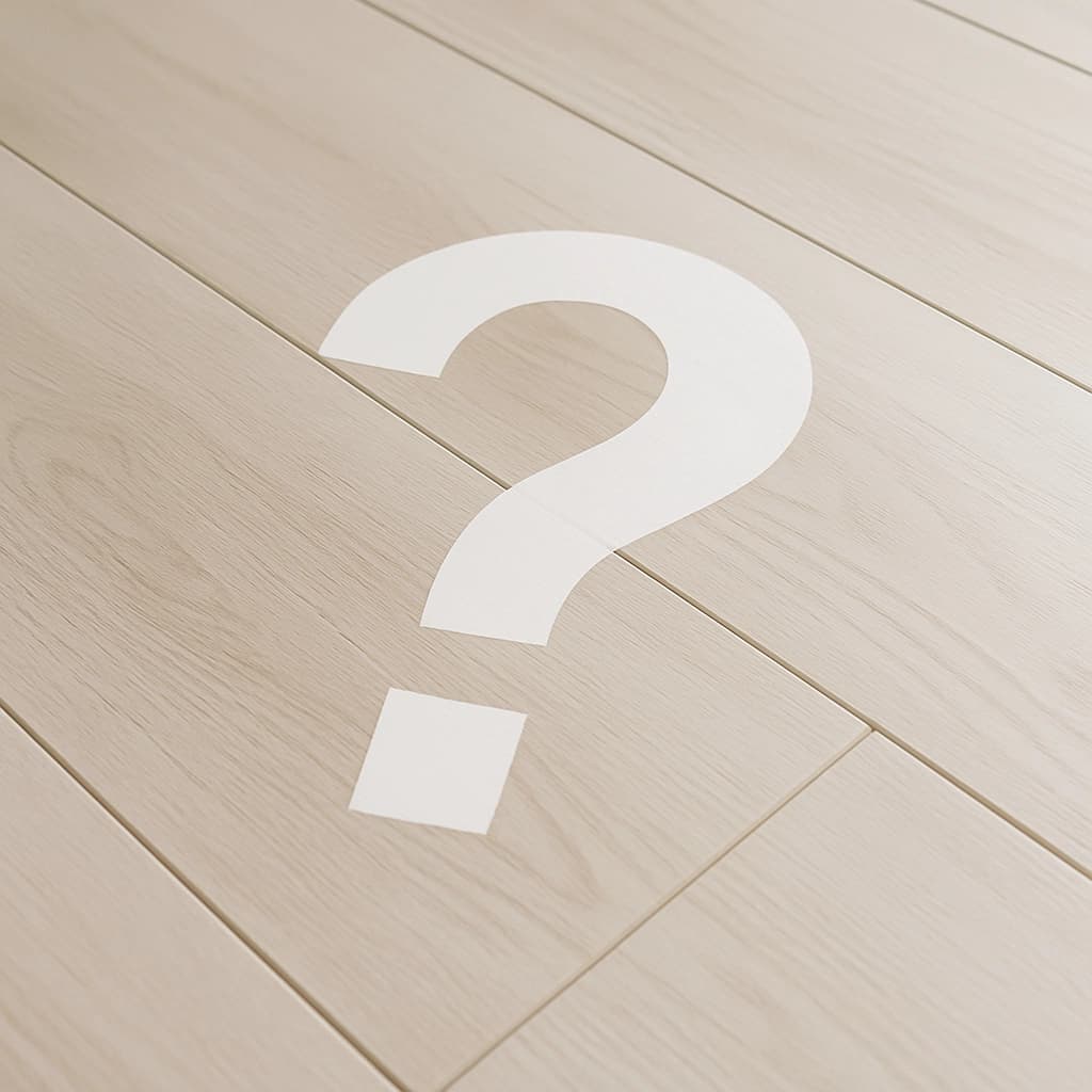 light wood floor with a white question mark overlay